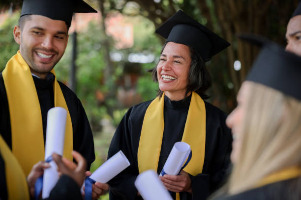 istock Group of post graduate students looking very happy on their graduation day 1349878865