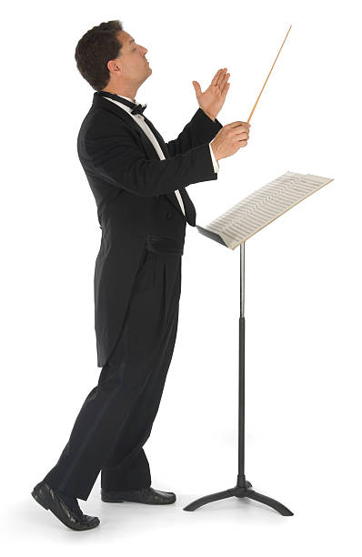 Orchestra Conductor on White Orchestra conductor on a white background conductors baton photos stock pictures, royalty-free photos & images