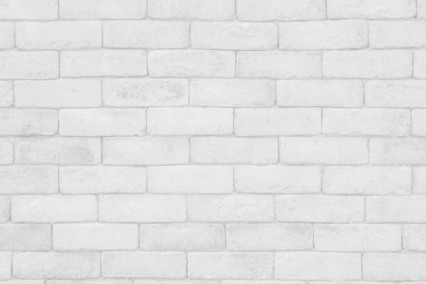 istock White grunge brick wall texture background for stone tile block painted in grey light color wallpaper modern interior and exterior and room backdrop design 1349894296