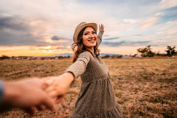 istock Pregnant woman taking husband for a walk 1349896141
