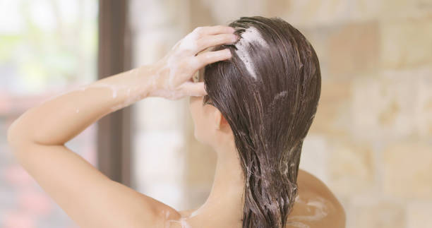 beauty woman wash her hair closeup of asian beauty girl wash her hair carefully wet hair stock pictures, royalty-free photos & images