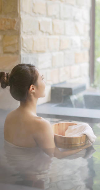 istock Woman in hot spring relax 1349897617
