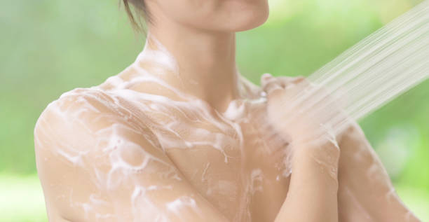 istock beauty woman enjoy shower 1349898184