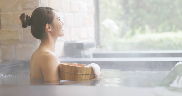 istock Woman in hot spring relax 1349898193
