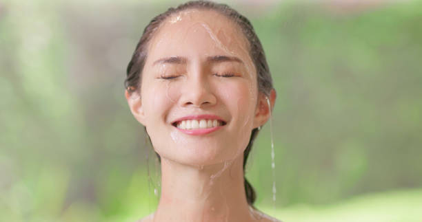 istock beauty woman take shower 1349898260