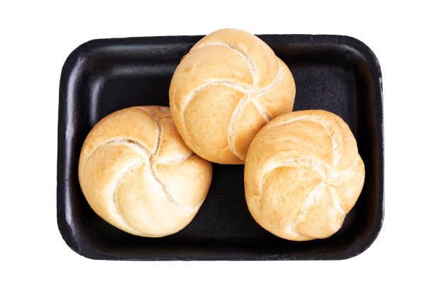 istock Three rolls isolated on black tray on white background. Healthy food concept 1349905909