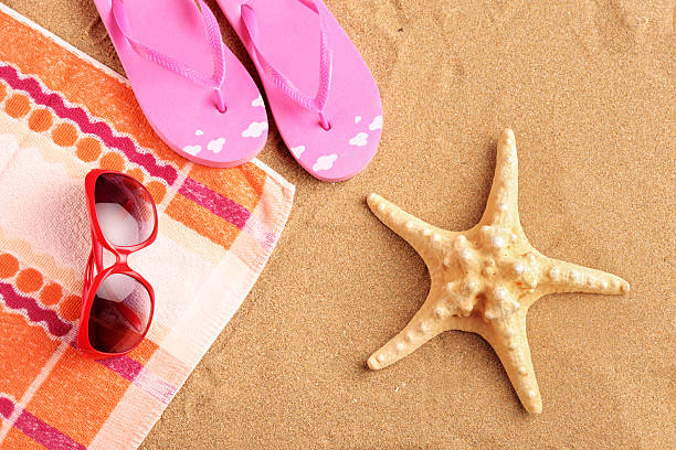 istock Towel, sandals, sunglasses and starfish 134991030