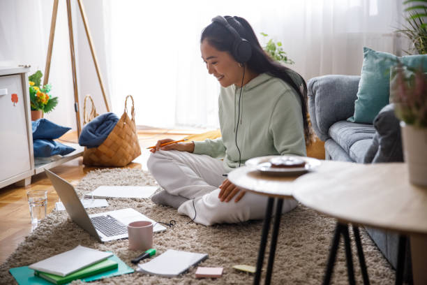 istock Diligently following online class via video conference call 1349910302