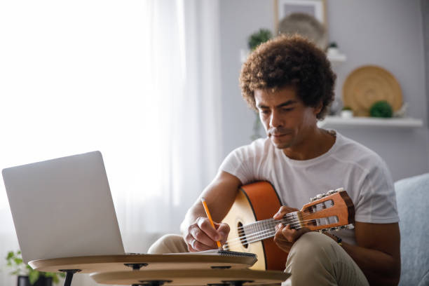 istock Creative musician writing and composing a song 1349910805