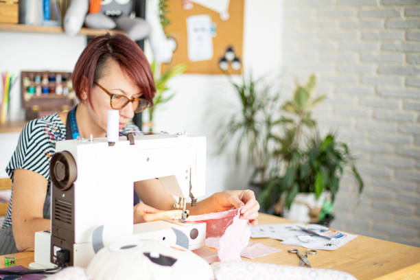 istock Woman making children toys, DIY, home workshop 1349918864