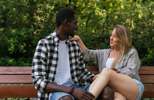 istock White woman talking to her afro boyfriend. 1349919954