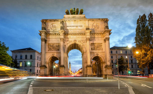istock illuminated Victory Gate in Munich at blue hour 1349921614