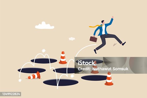 istock Avoid pitfall, adversity and brave to jump pass mistake or business failure, skill and creativity to solve problem concept, smart businessman jump pass many pitfalls to achieve business success. 1349922824