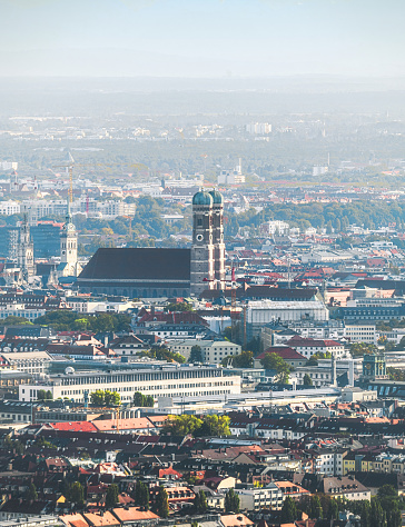 arial view over Munich cityscape with Frauenkirche at hazy day