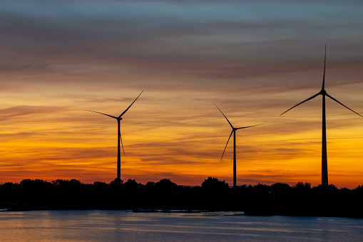 Sunset on the Elbe, wind turbines in the background