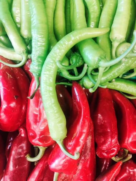 istock Green and red peppers closeup 1349944780