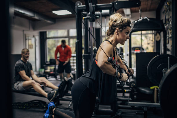 istock Woman training in gym 1349945320