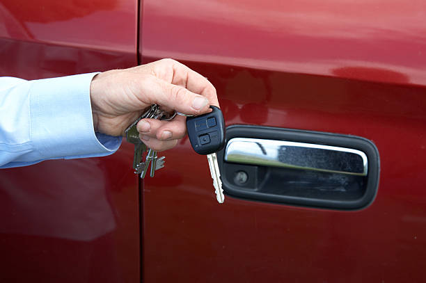 istock woman holding car keys 134994643