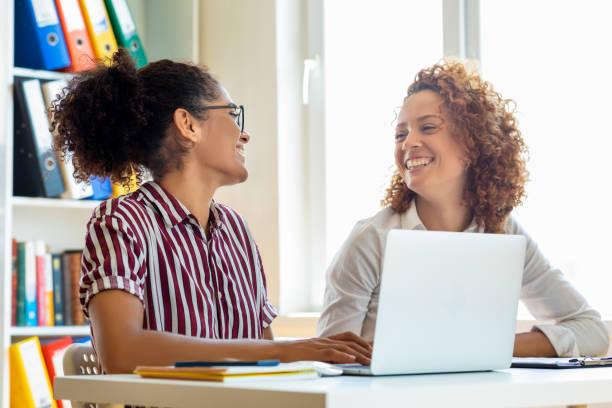 istock Two businesswomen working in office 1349952630