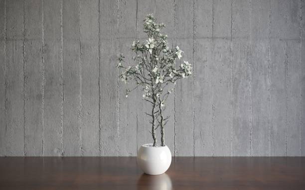 istock Decorative flowers in a vase on the table. 3D illustration, cg render 1349960390