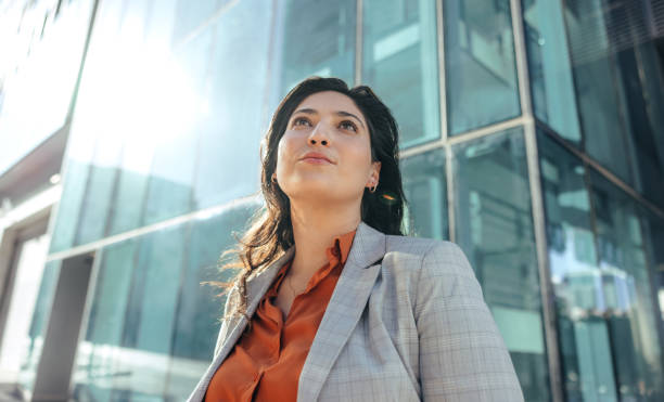 istock Female entrepreneur looking thoughtful outdoors 1349961204
