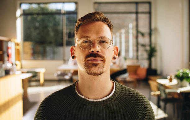 istock Confident male entrepreneur at co-working office 1349961874