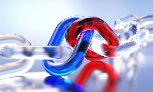 Blue and red links with glass chain. Teamwork concept