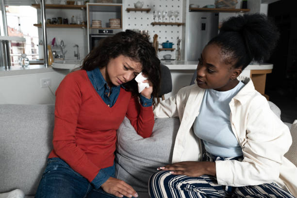 istock Condolence and support concept. Caring woman hugging her crying girlfriend, comforting her after receiving bad news. Woman cry after breaking up with her boyfriend. 1349972198