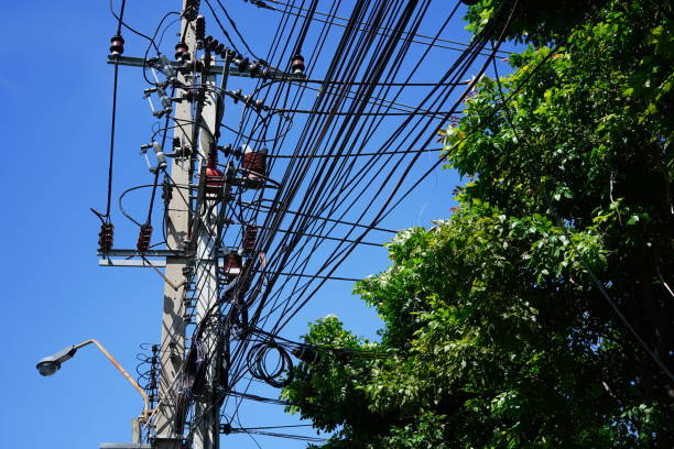istock Power cable electricity on blue sky background 1349972269