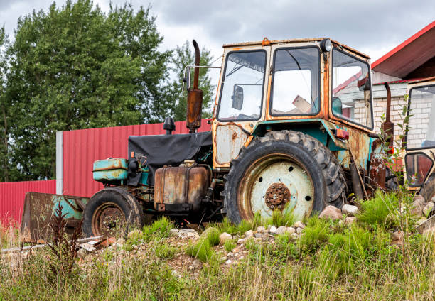 istock Old rusty wheeled tractor at the village 1349972350