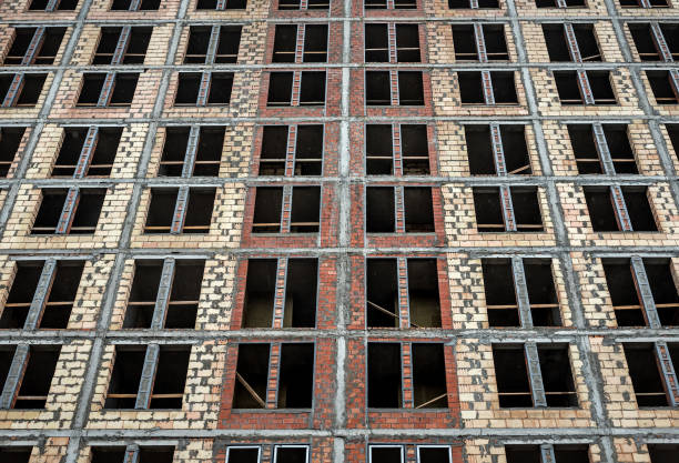 istock New apartment building facade with many windows and flat rooms 1349972840
