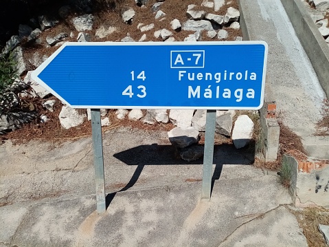 A7 motorway Malaga, Fuengirola directional road sign in Sitio de Calahonda, Mijas, Costa Del Sol, Spain.