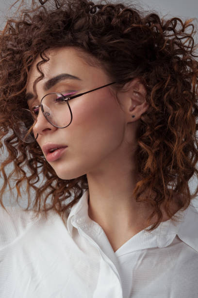 istock Beautiful woman wearing spectacles 1349975250