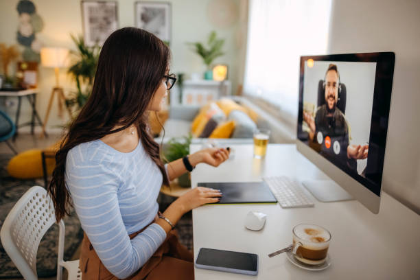 istock Business meeting on video call during 1349975749