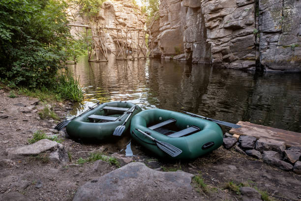 istock two inflatable boats with oars 1349978656
