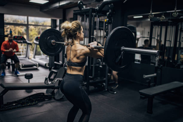 istock Strong woman training in gym 1349979139