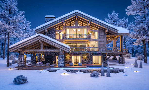 istock 3d rendering of modern cozy chalet in winter night 1349982719