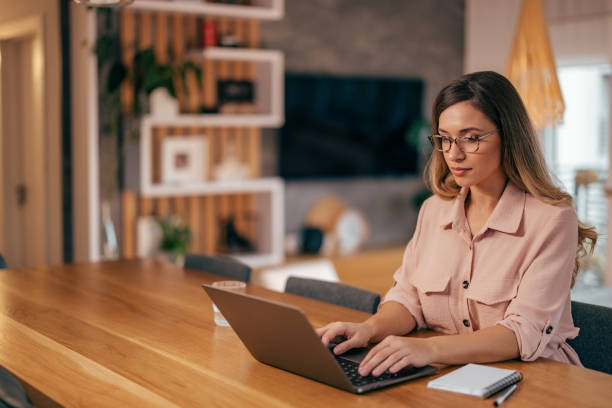 istock Young woman, taking her job seriously 1349984466