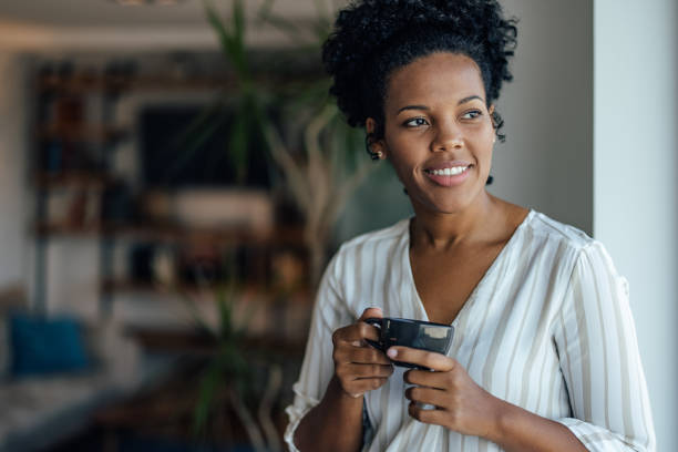 istock Smiling woman, taking a short break 1349984496