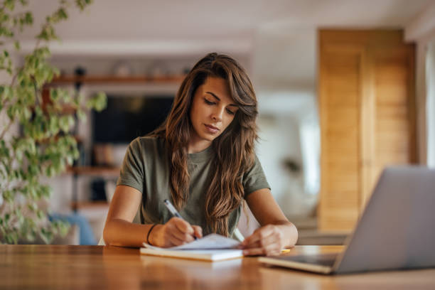 istock Adult woman, making sure she does everything on time 1349984575