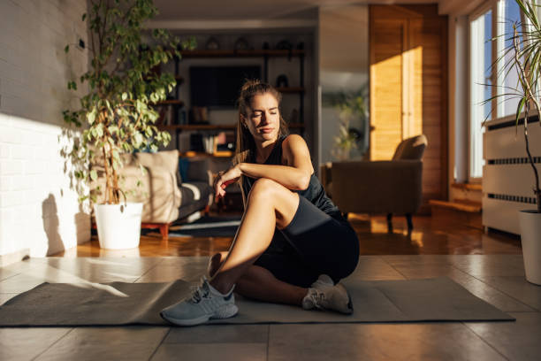 istock Relaxed adult woman, working on her flexibility 1349986837