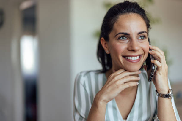 istock Shot of an attractive woman, smiling while talking 1349987044