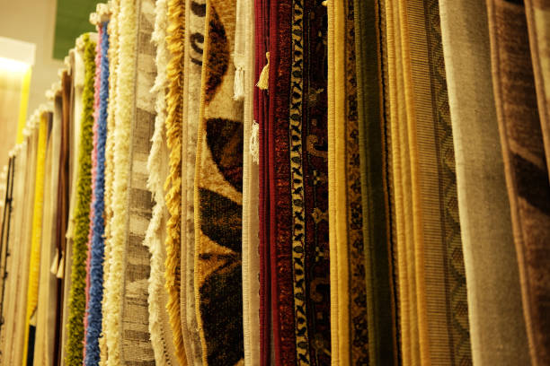 istock Assortment of different carpets in store 1349990382