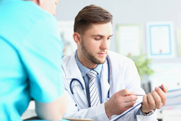 istock Discuss with colleague ill history 1349995453