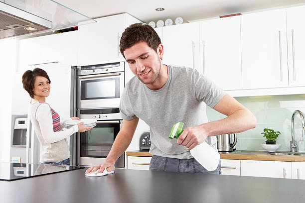 istock Young Couple Cleaning Kitchen 134999706