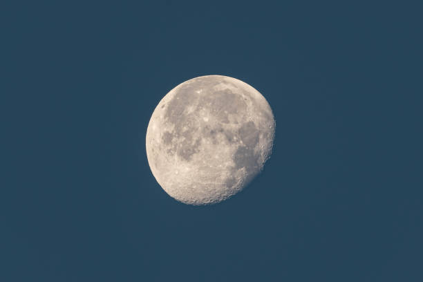istock Moon in the night sky background 1349998553