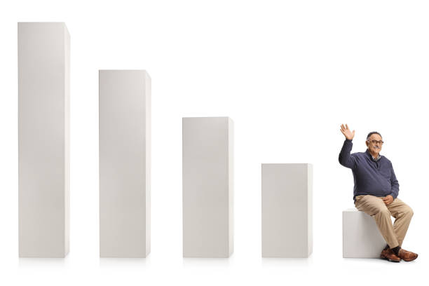 istock Mature casual man sitting on the smallest column graph and waving 1350002814