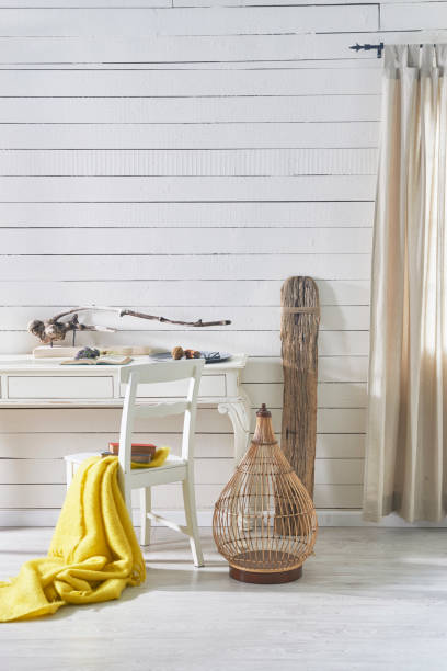 istock modern living room textured wall with table puff and plant 1350003347