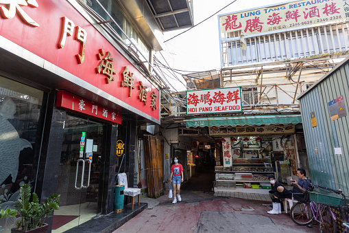 Hong Kong - October 29, 2021 : Seafood market in Lei Yue Mun, Kowloon, Hong Kong. Lei Yue Mun is famous for its seafood market and seafood restaurants in this fishing village.