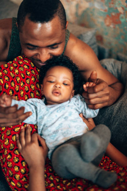 istock african father playing with the son 1350008475
